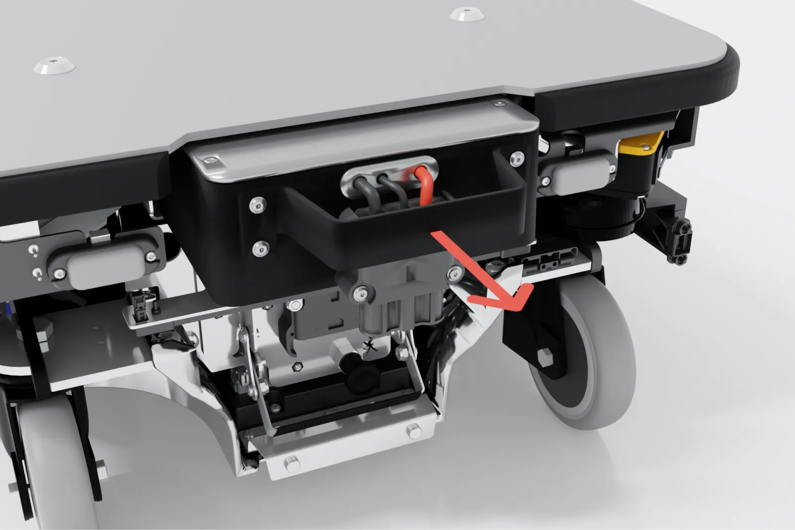 The battery being pulled out of the robot
