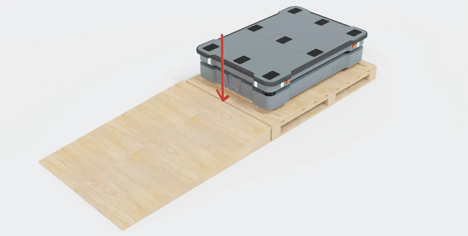 Click to view full size The lid is placed as a ramp on the end of the pallet in front of the robot.